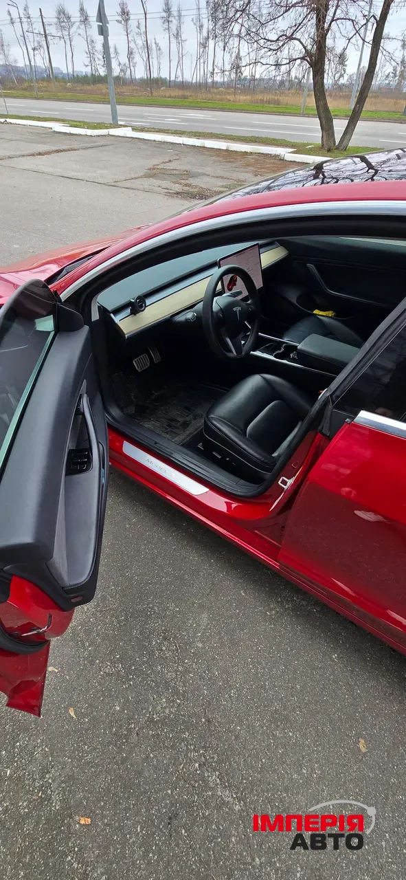 Tesla Model 3 - фото 11