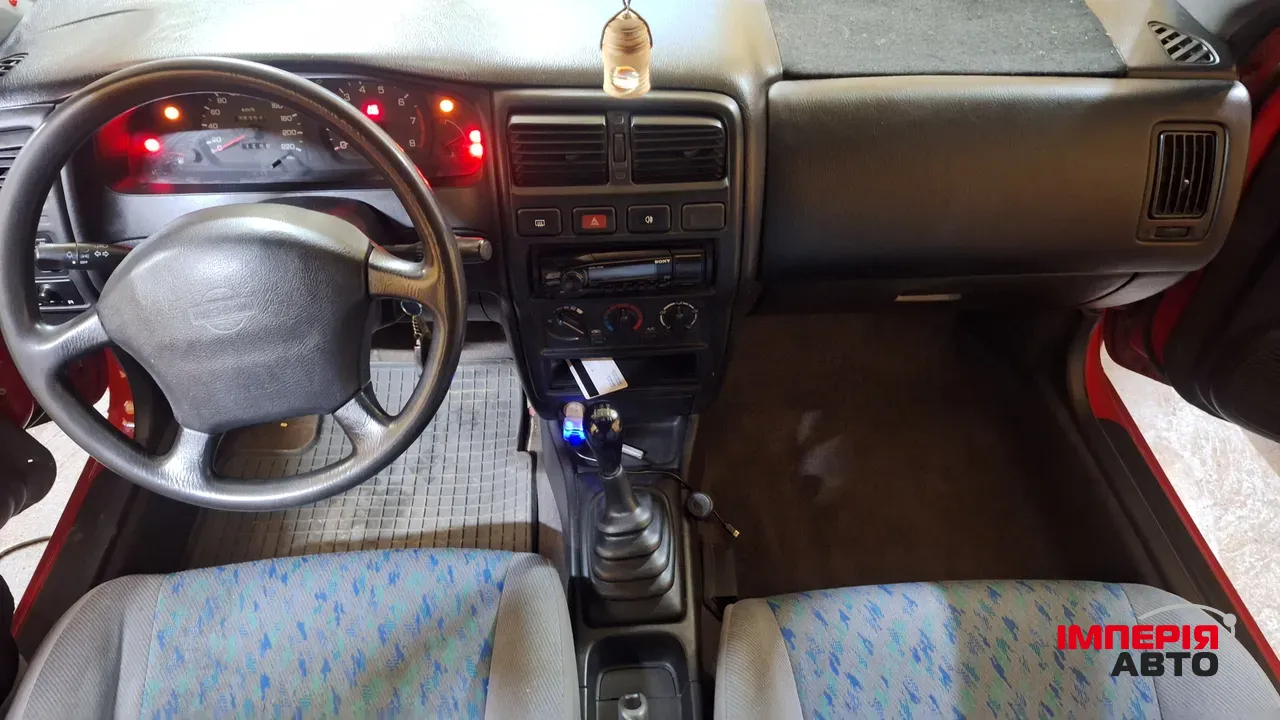 Nissan Almera - фото 9