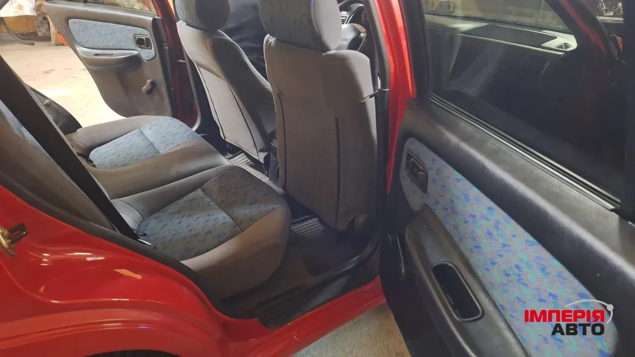 Nissan Almera - фото 8