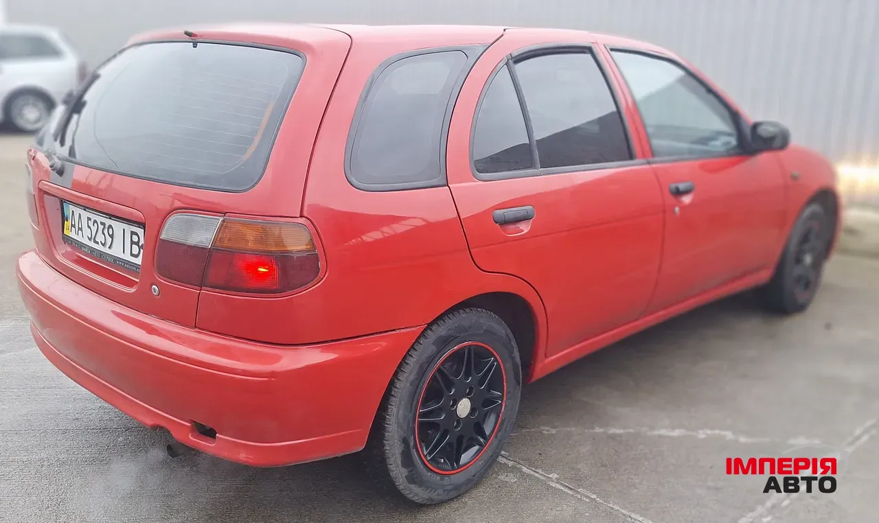 Nissan Almera - фото 3