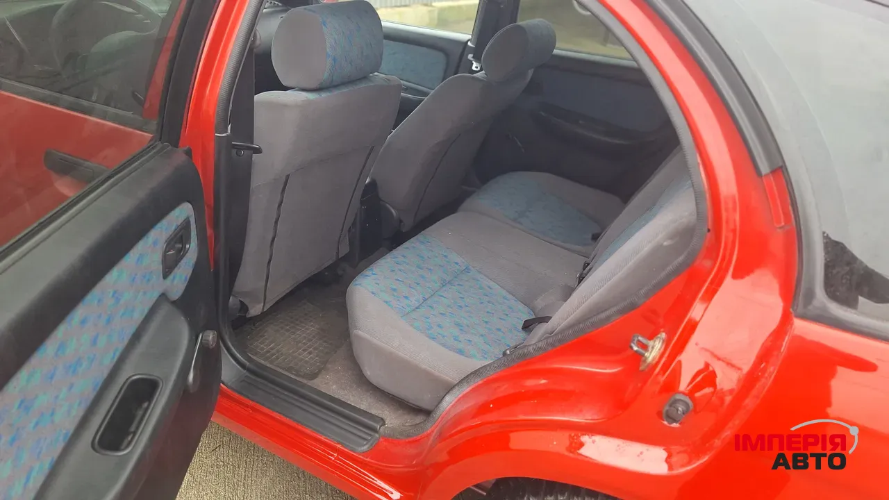 Nissan Almera - фото 7