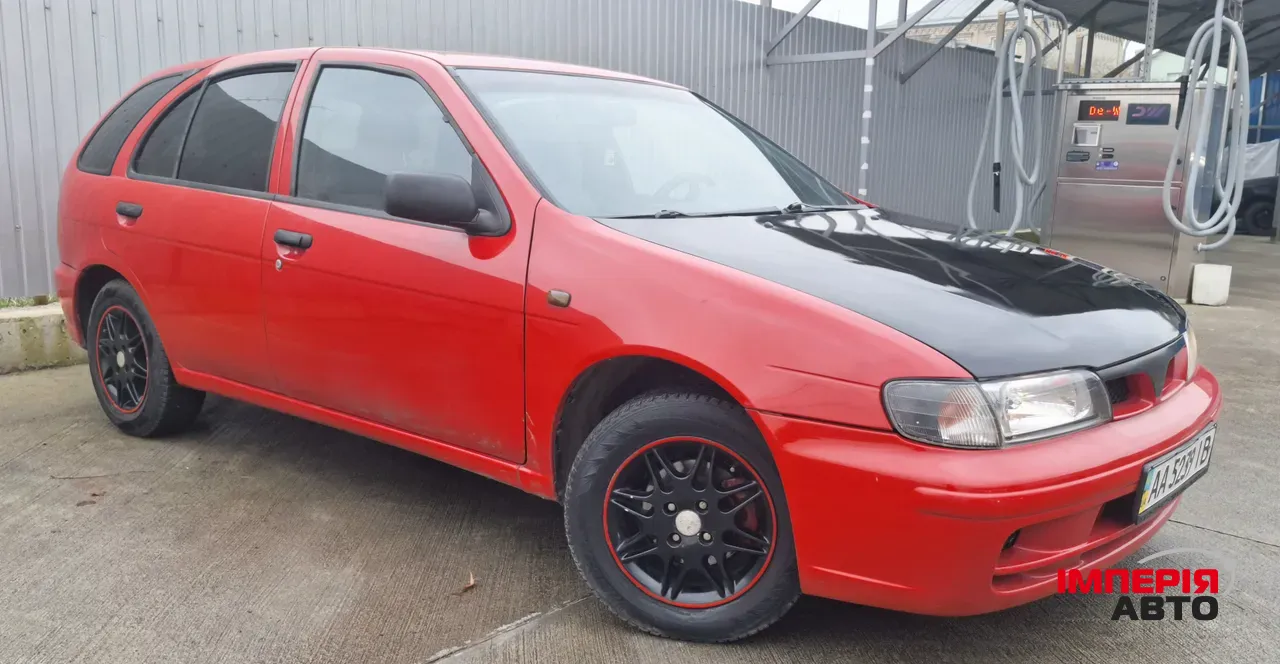 Nissan Almera - фото 2