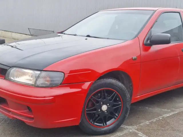 Nissan Almera - фото 4