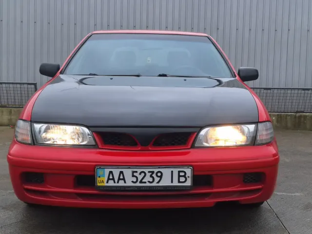 Nissan Almera - фото 1