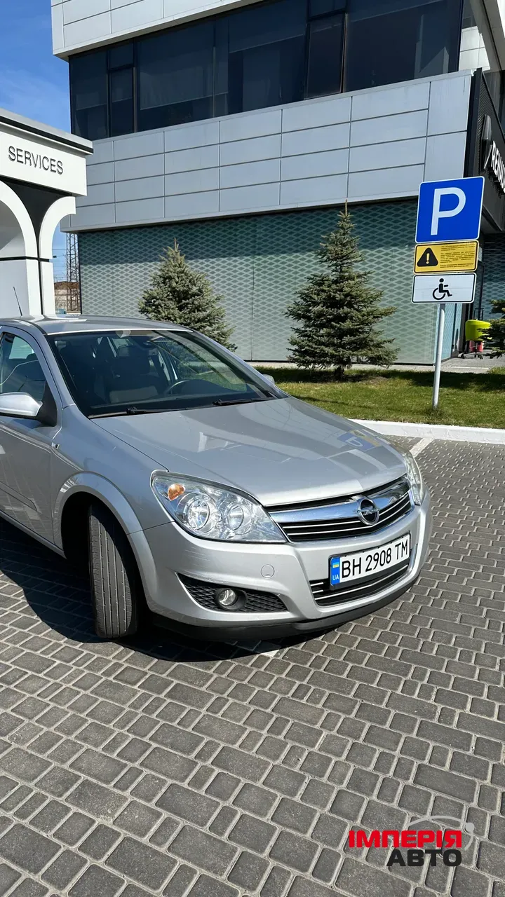 Opel Astra - фото 1