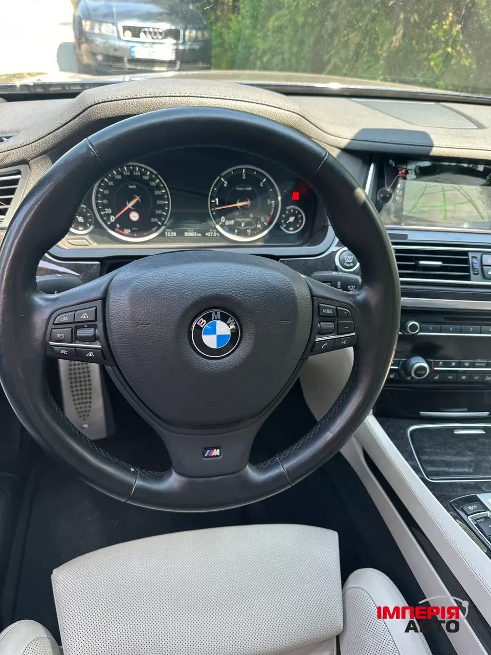 BMW 7 серії - фото 29