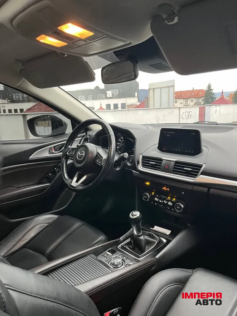 Mazda 3 - фото 7