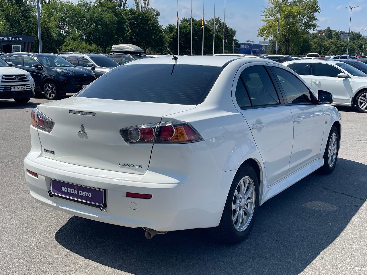 Mitsubishi Lancer - фото 12