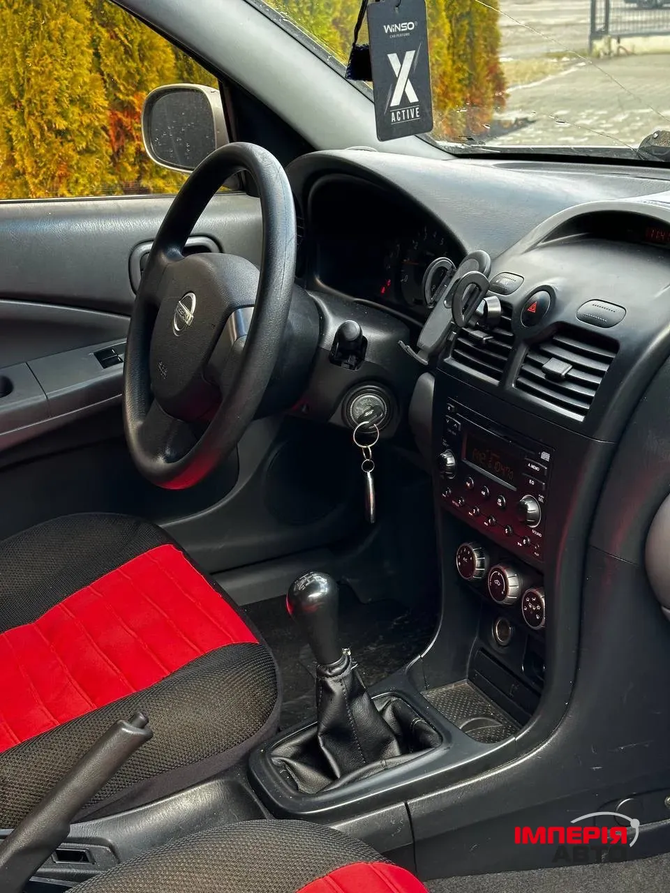 Nissan Almera Classic - фото 7