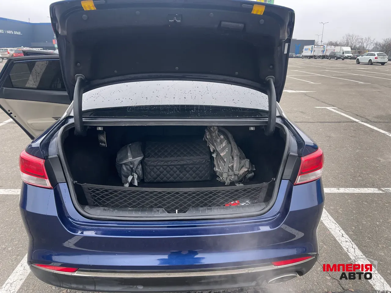 Kia Optima - фото 5