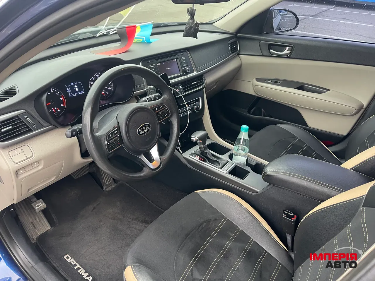 Kia Optima - фото 4