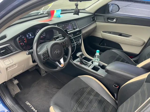 Kia Optima - фото 4