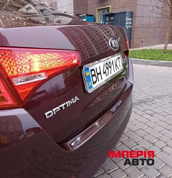 Kia Optima - фото 8