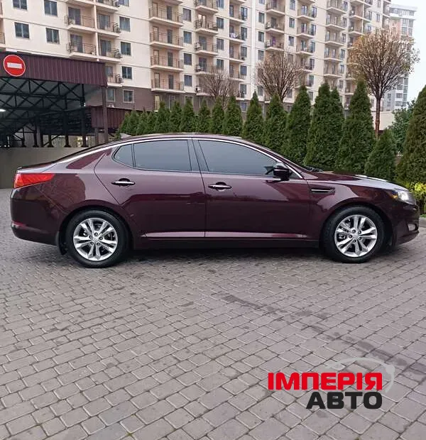 Kia Optima - фото 4