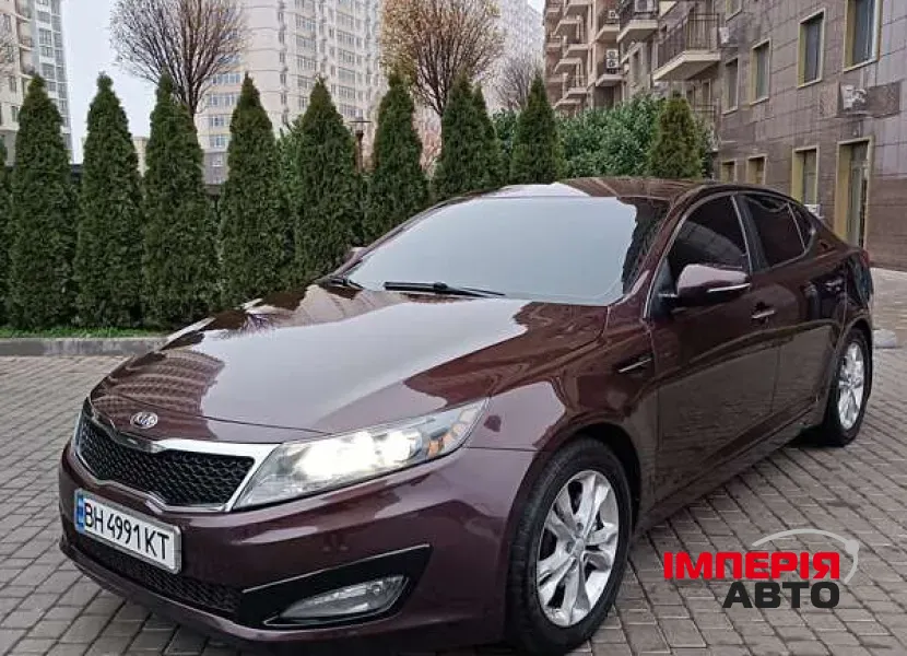 Kia Optima - фото 1