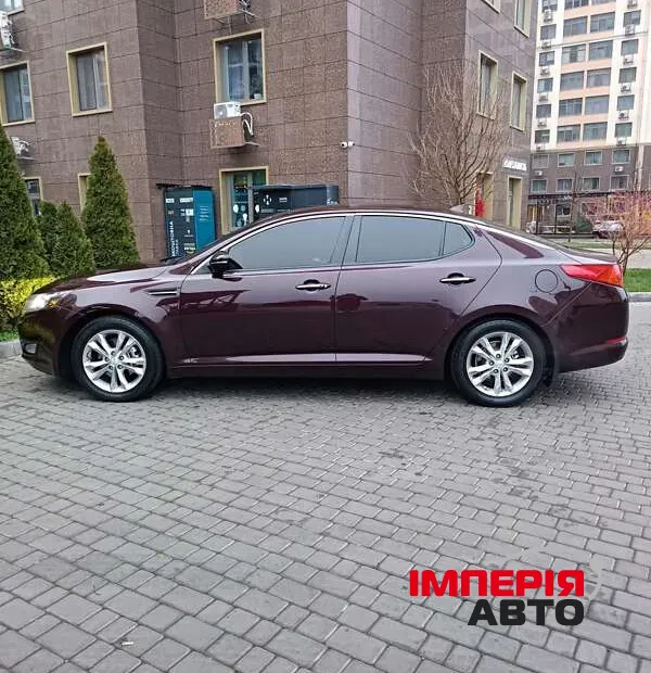 Kia Optima - фото 10