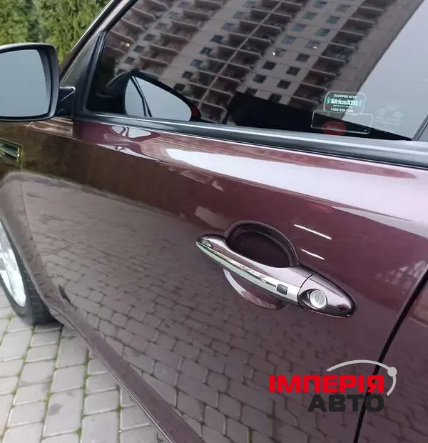 Kia Optima - фото 11