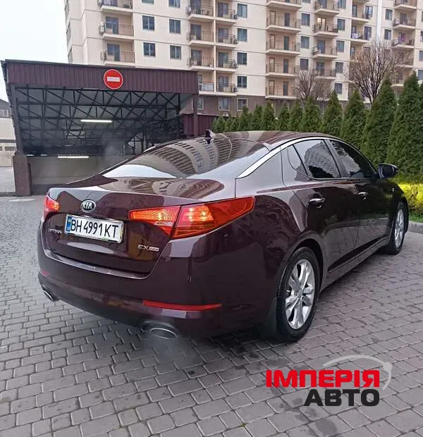 Kia Optima - фото 5