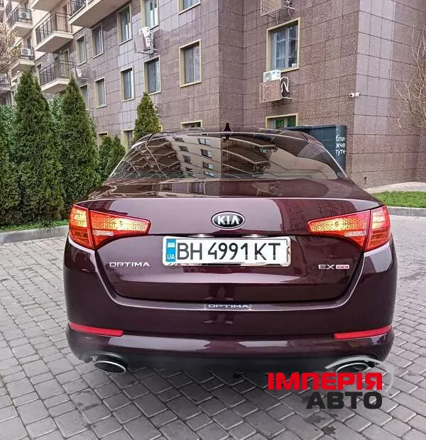 Kia Optima - фото 7