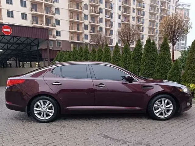 Kia Optima - фото 4