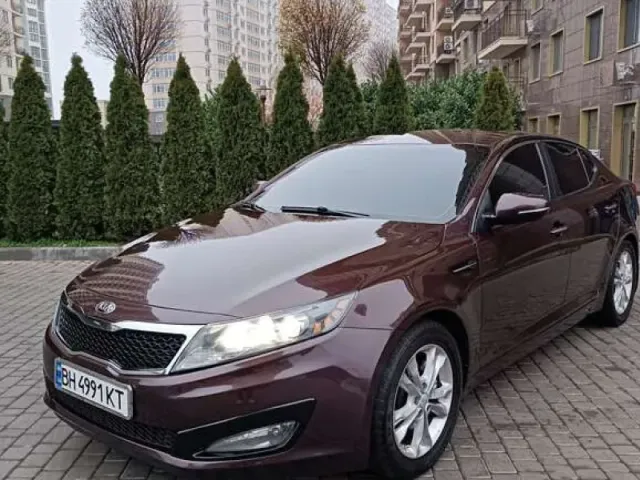 Kia Optima - фото 1