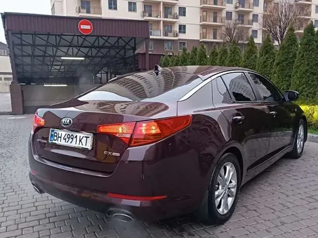 Kia Optima - фото 5