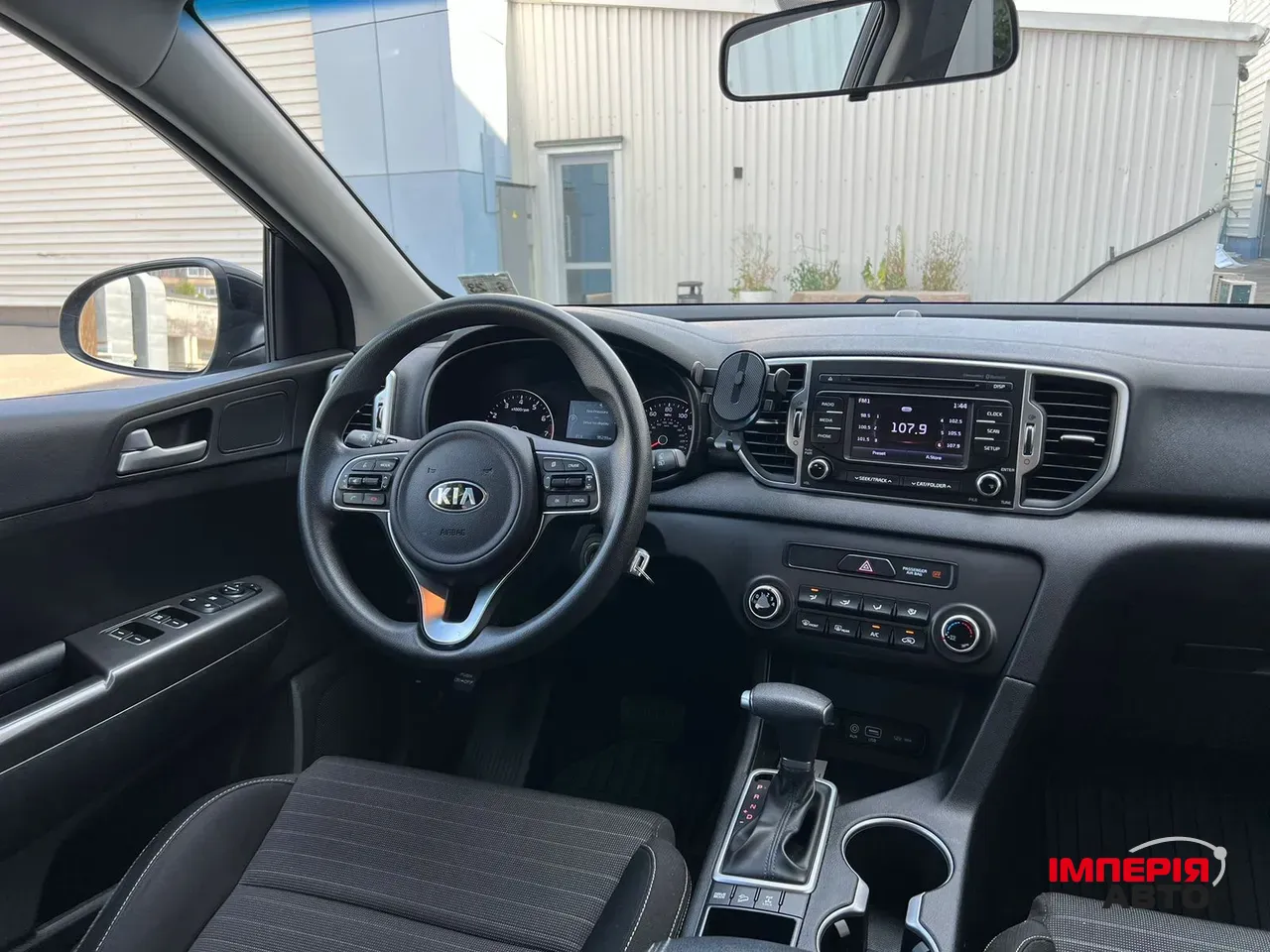 Kia Sportage - фото 23