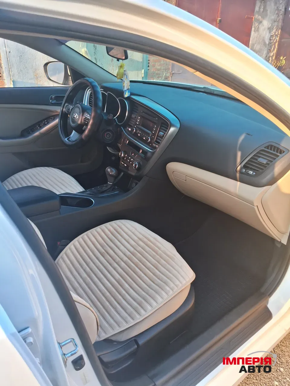 Kia Optima - фото 8