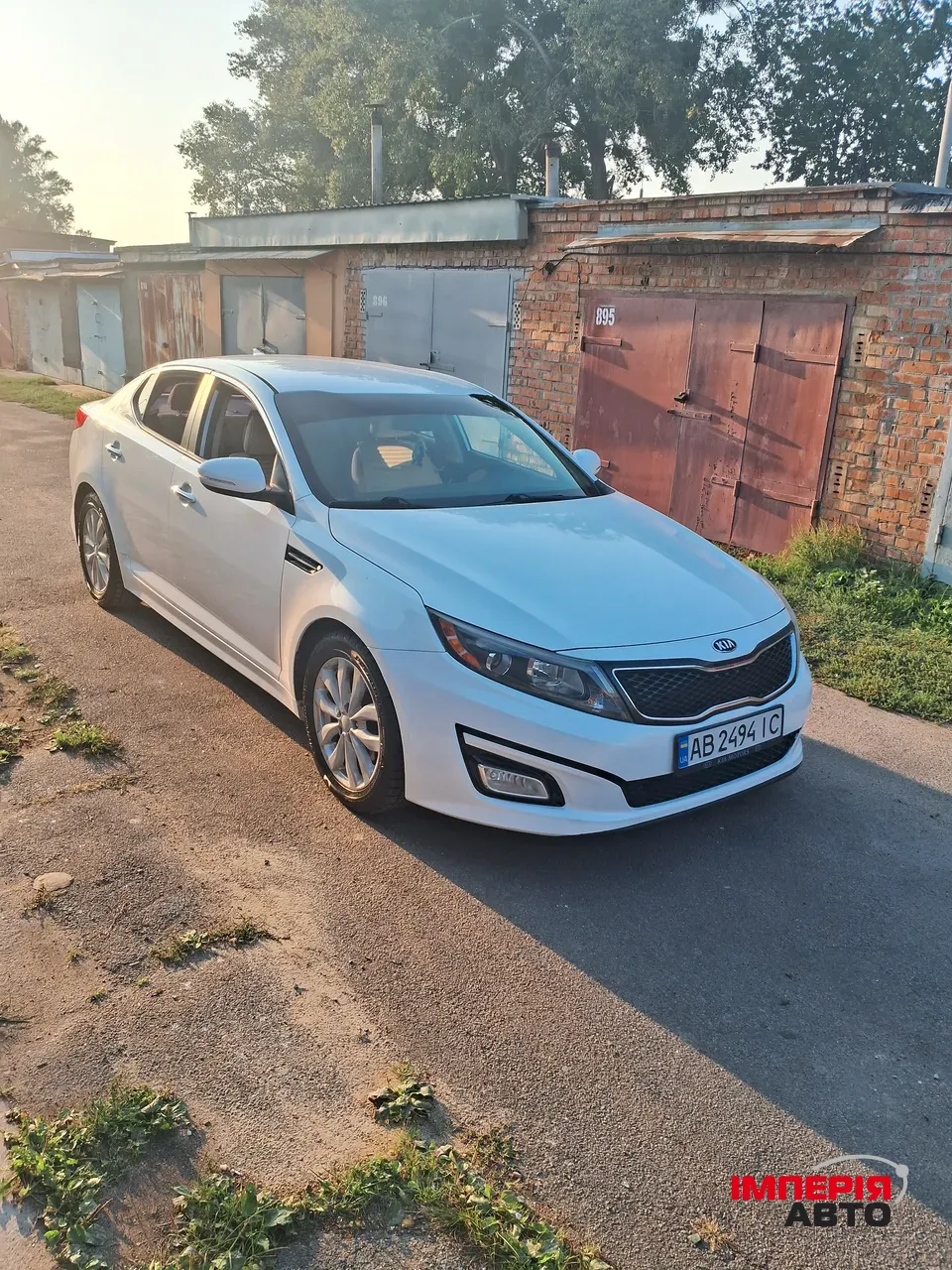 Kia Optima - фото 1