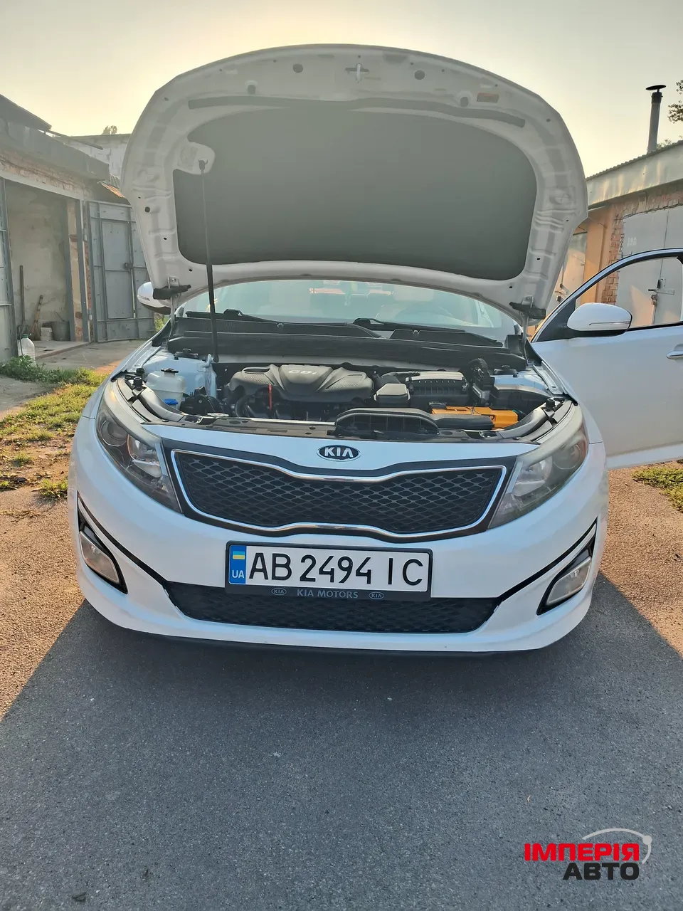 Kia Optima - фото 14