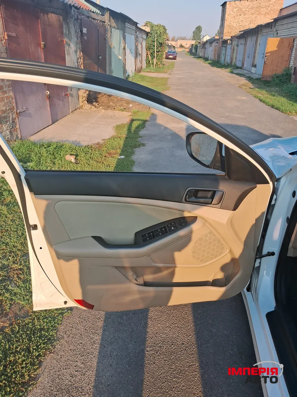 Kia Optima - фото 5