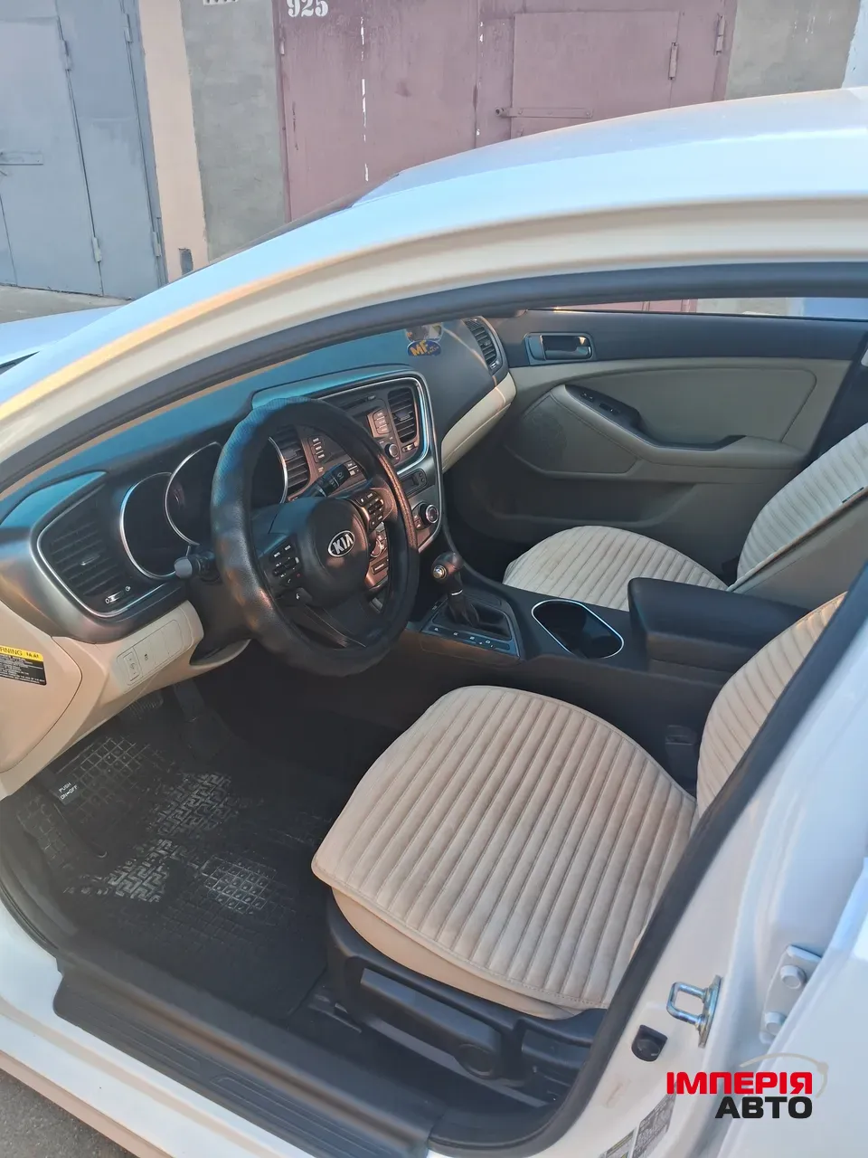 Kia Optima - фото 6