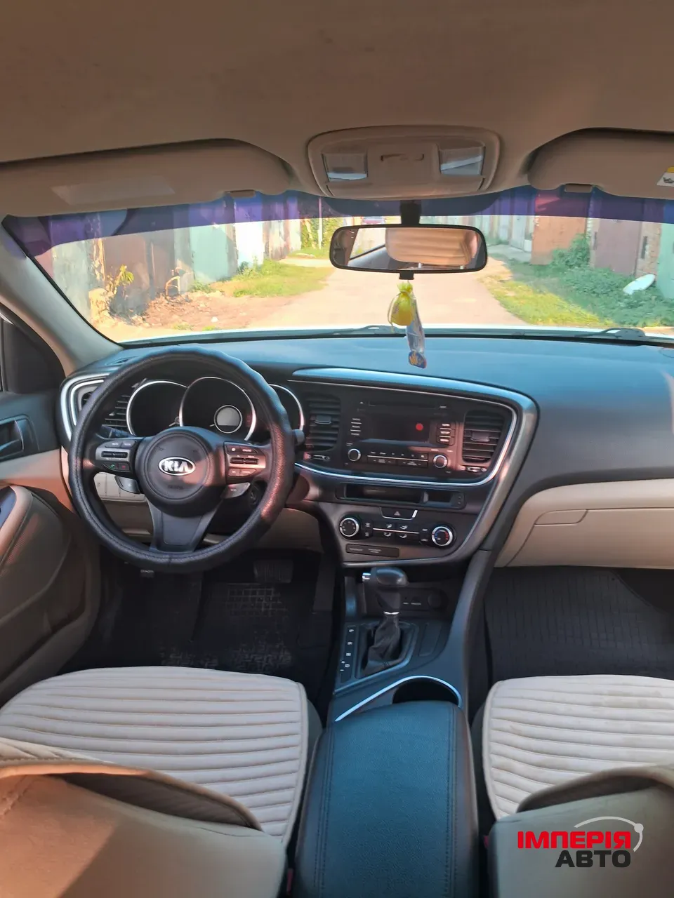 Kia Optima - фото 10