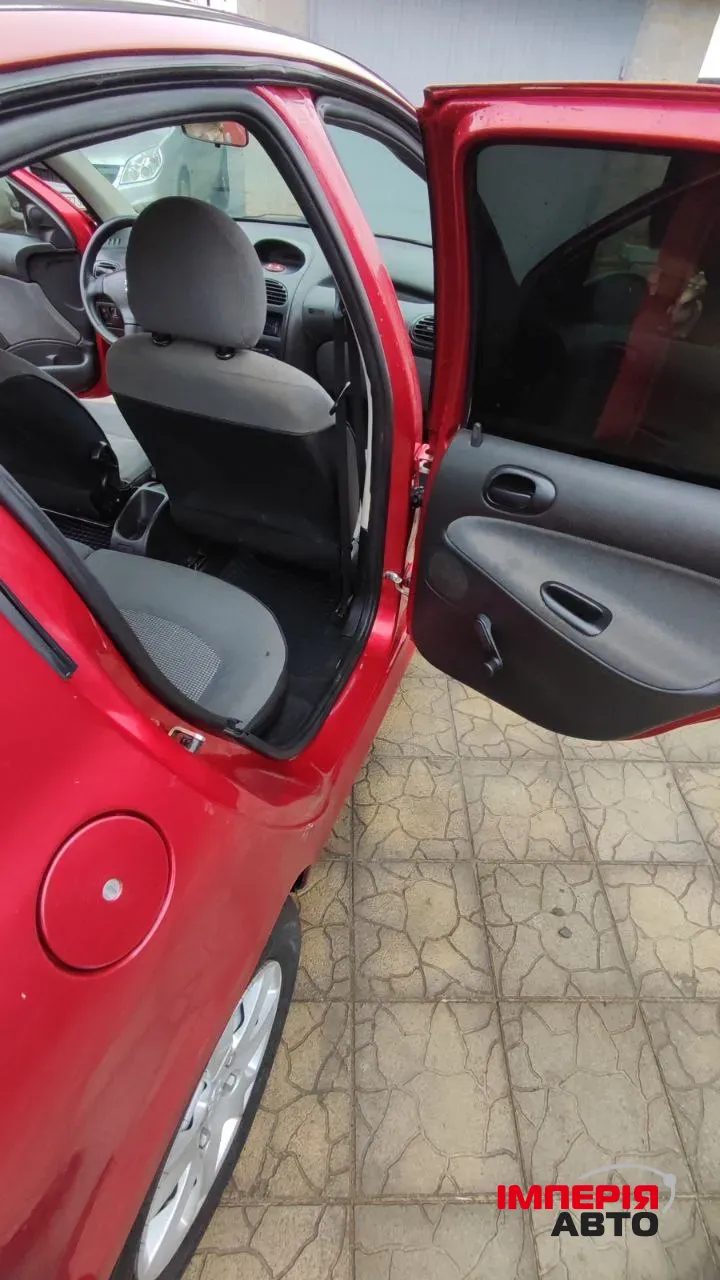 Peugeot 206 - фото 18
