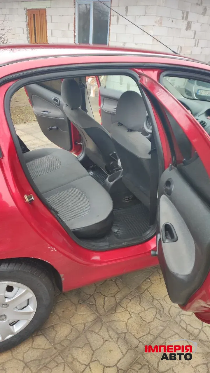 Peugeot 206 - фото 15