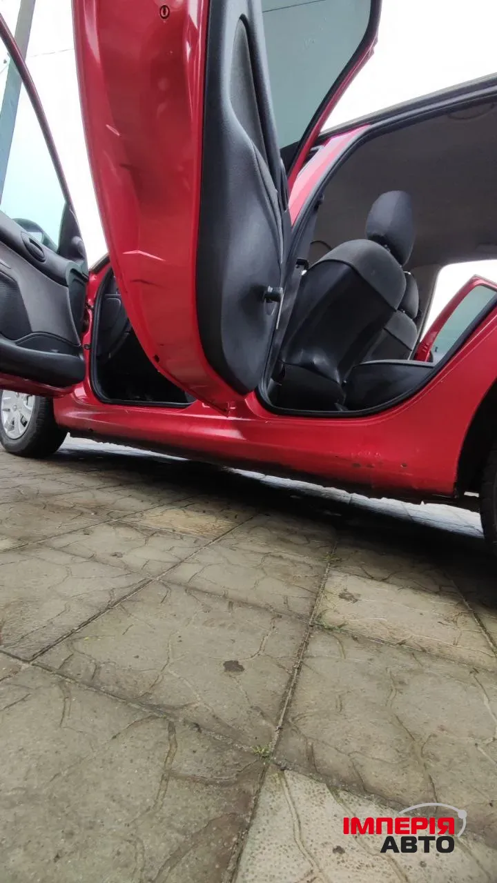 Peugeot 206 - фото 25