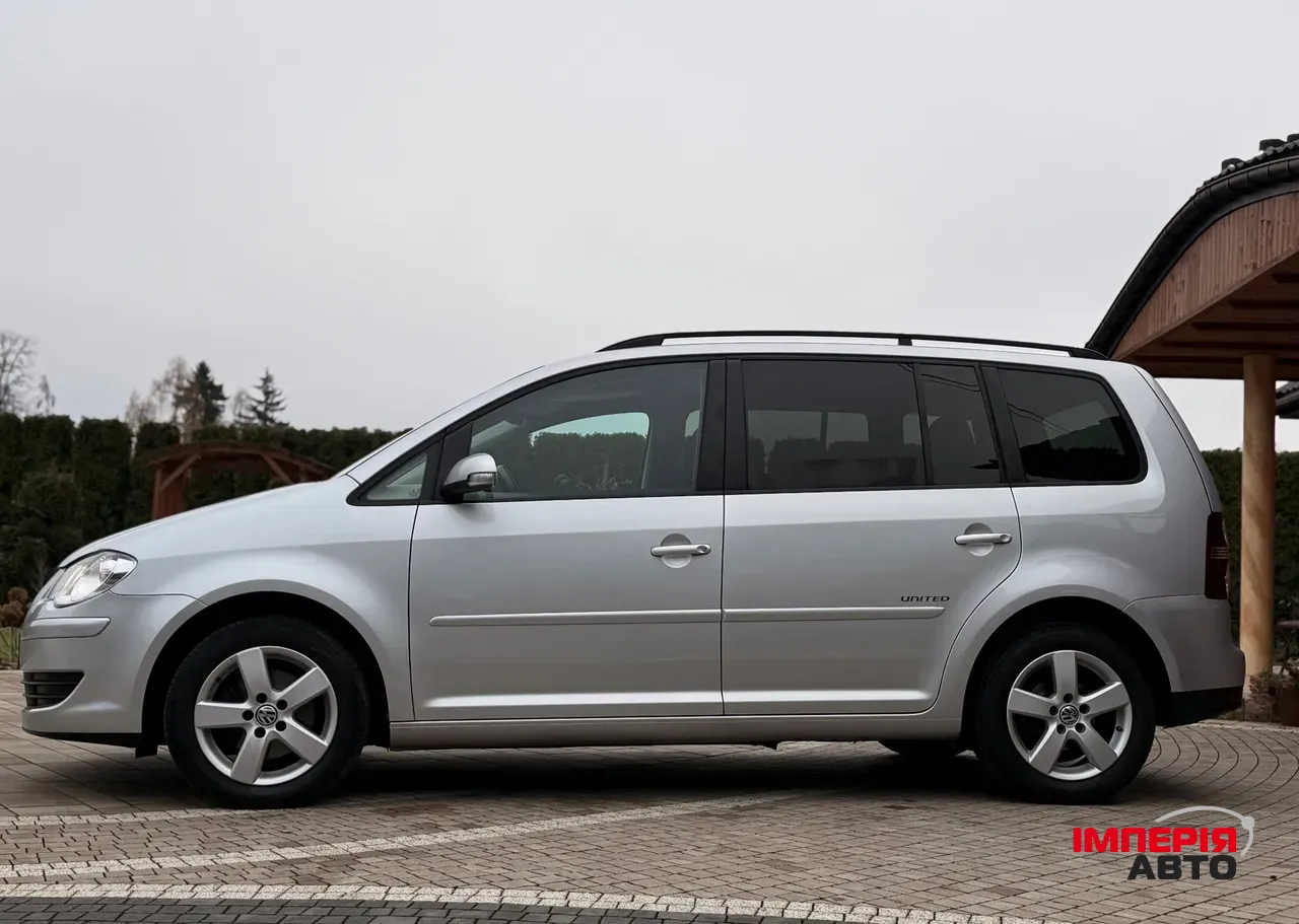 Volkswagen Touran - фото 20