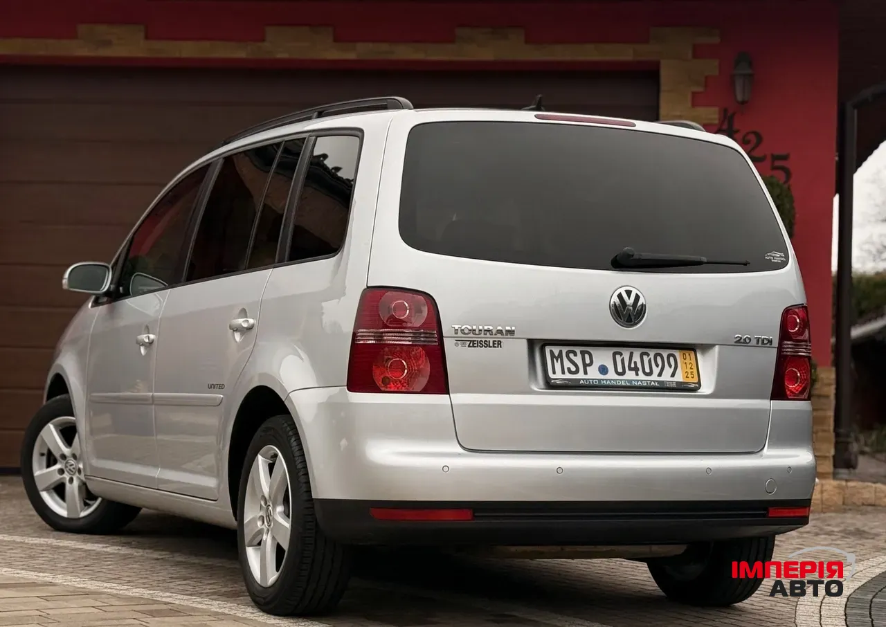 Volkswagen Touran - фото 16