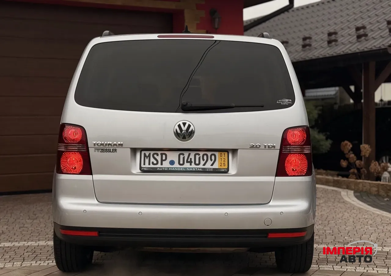Volkswagen Touran - фото 15