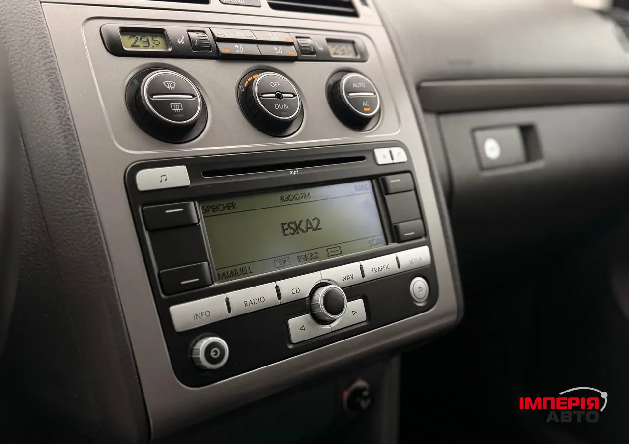 Volkswagen Touran - фото 3