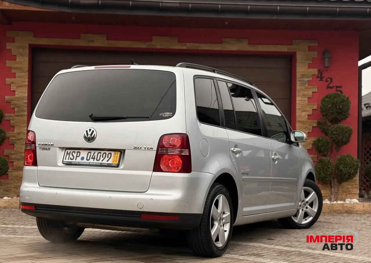 Volkswagen Touran - фото 14