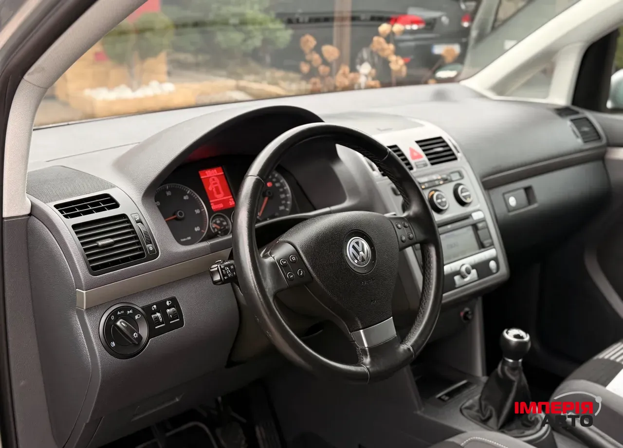 Volkswagen Touran - фото 9