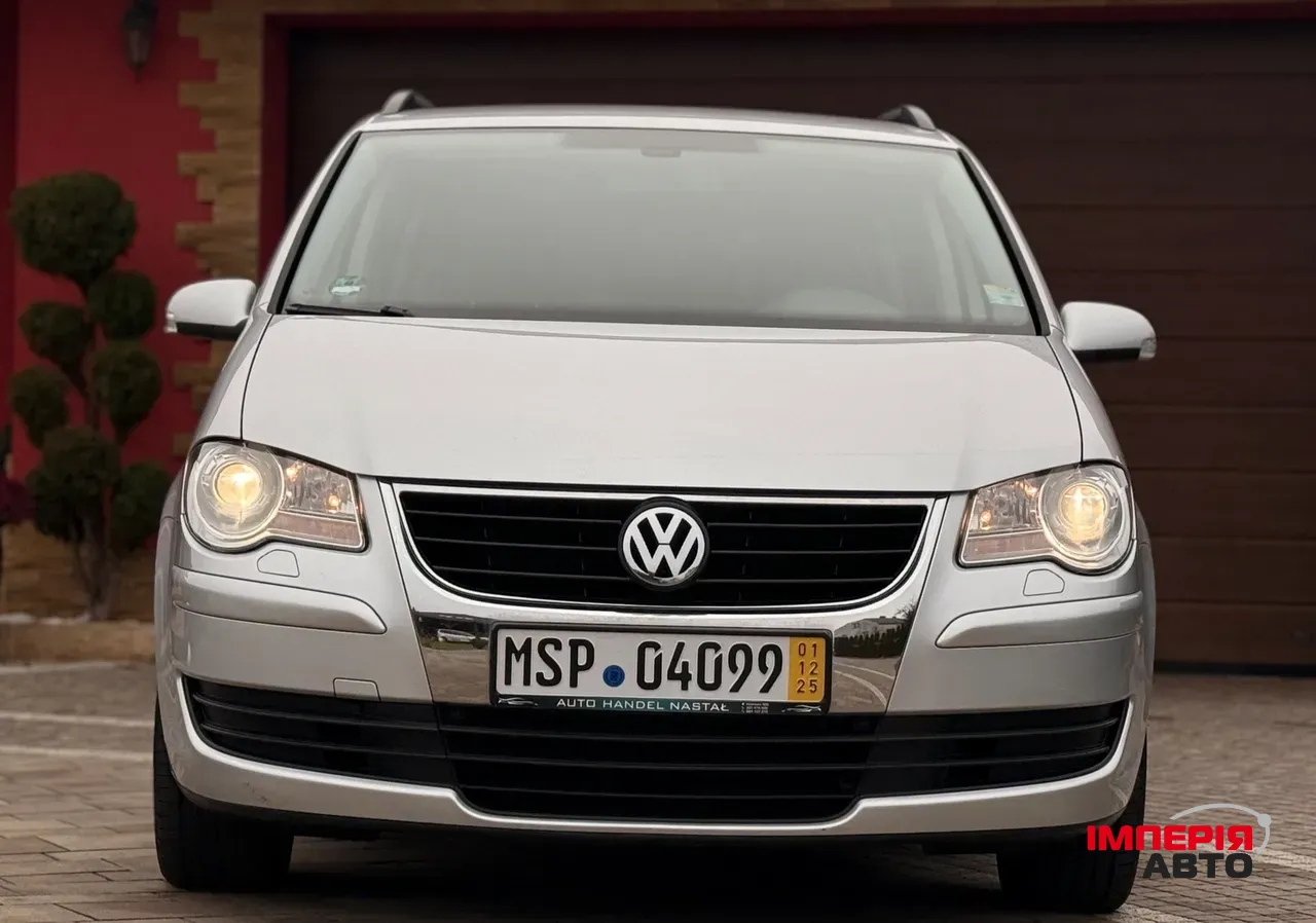 Volkswagen Touran - фото 17