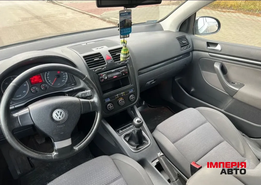 Volkswagen Golf - фото 13