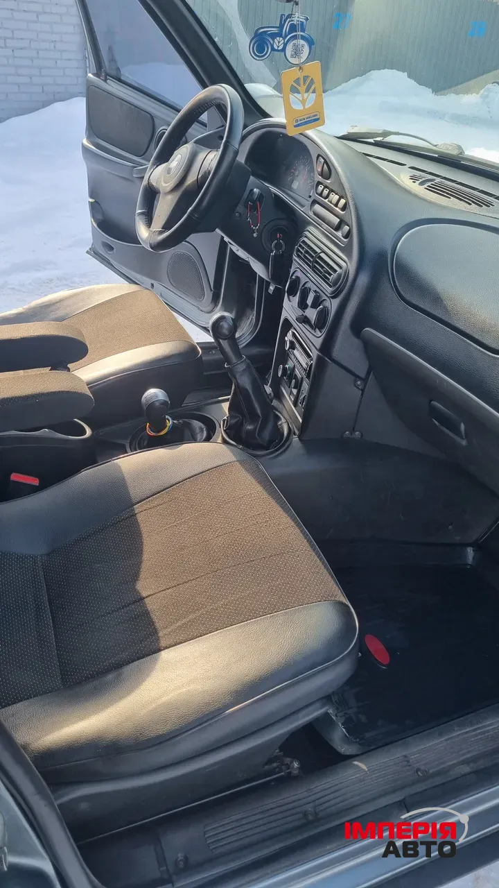 Chevrolet Niva - фото 6