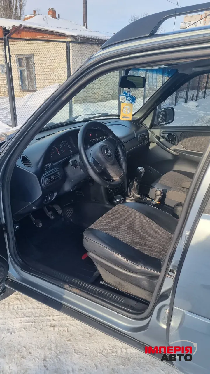 Chevrolet Niva - фото 8
