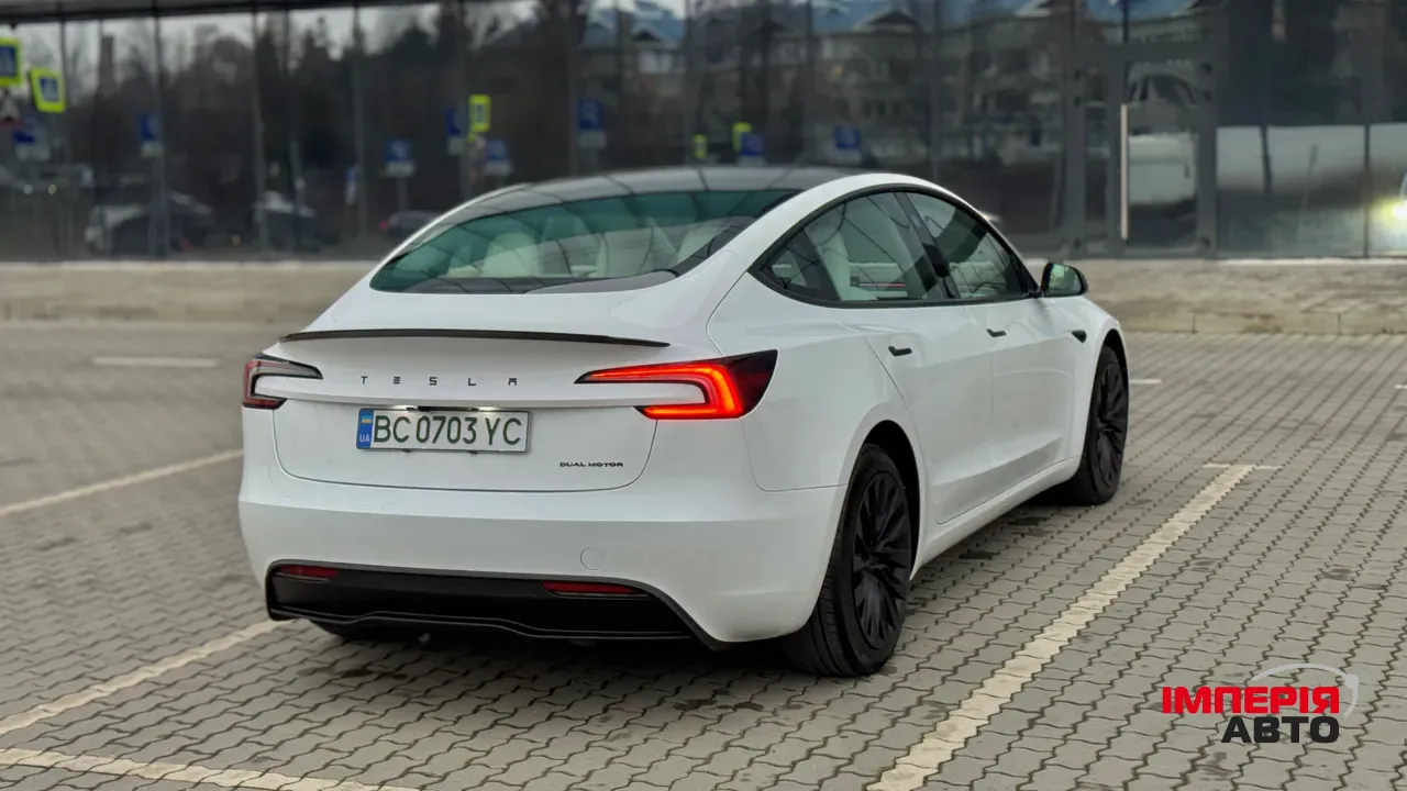 Tesla Model 3 - фото 14