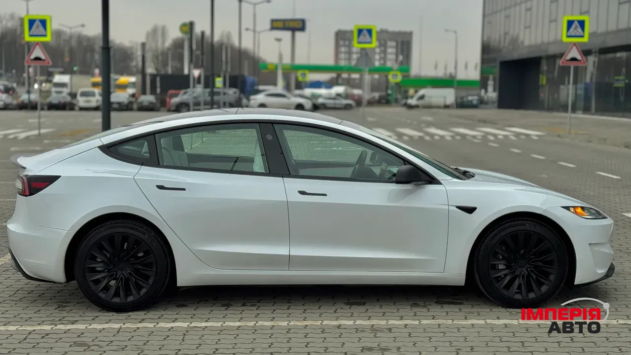 Tesla Model 3 - фото 16