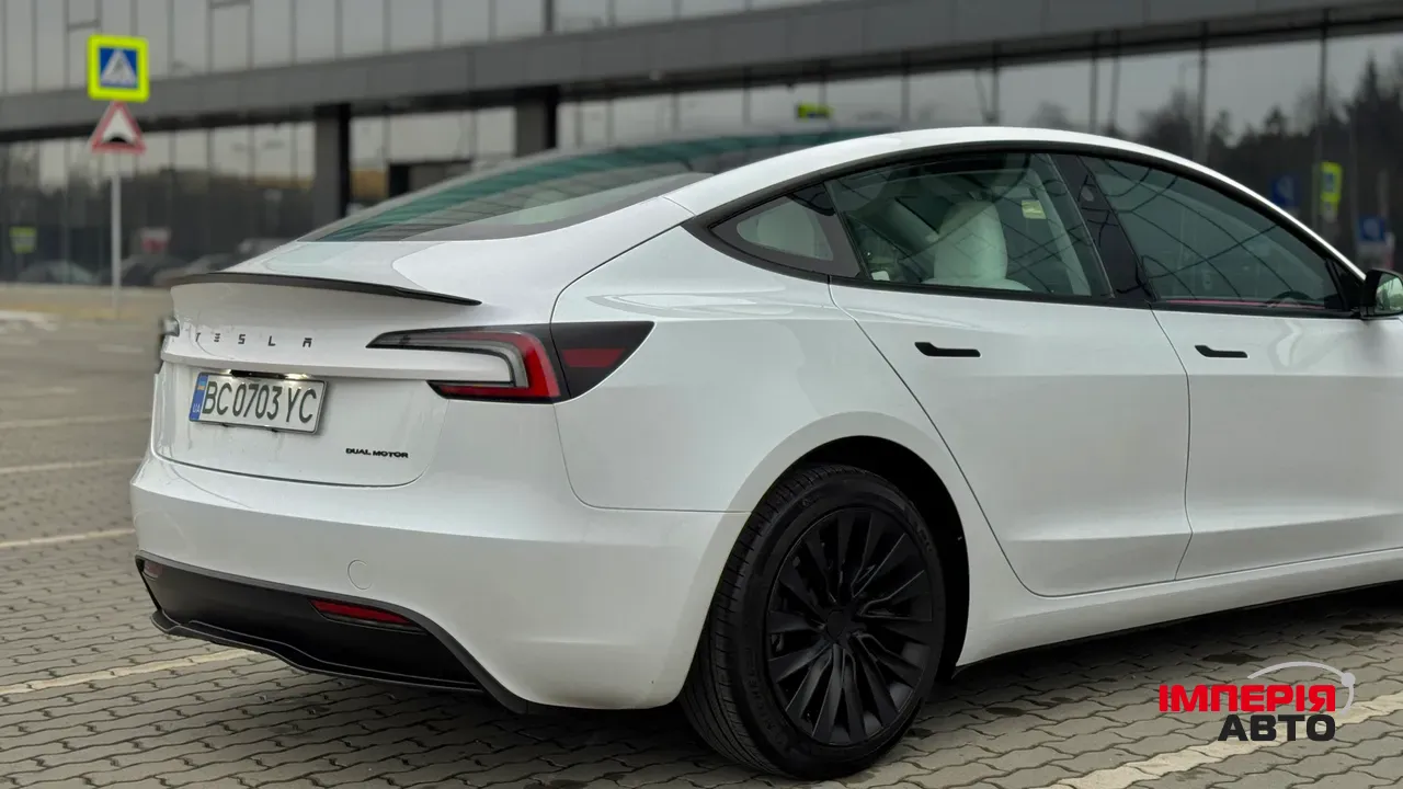 Tesla Model 3 - фото 9