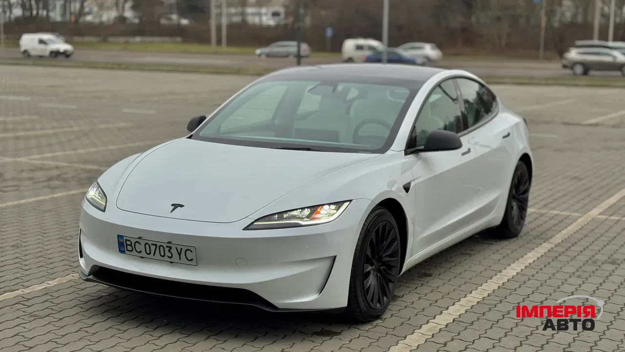 Tesla Model 3 - фото 11